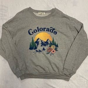 Wound up woman’s crewneck. Size 2X